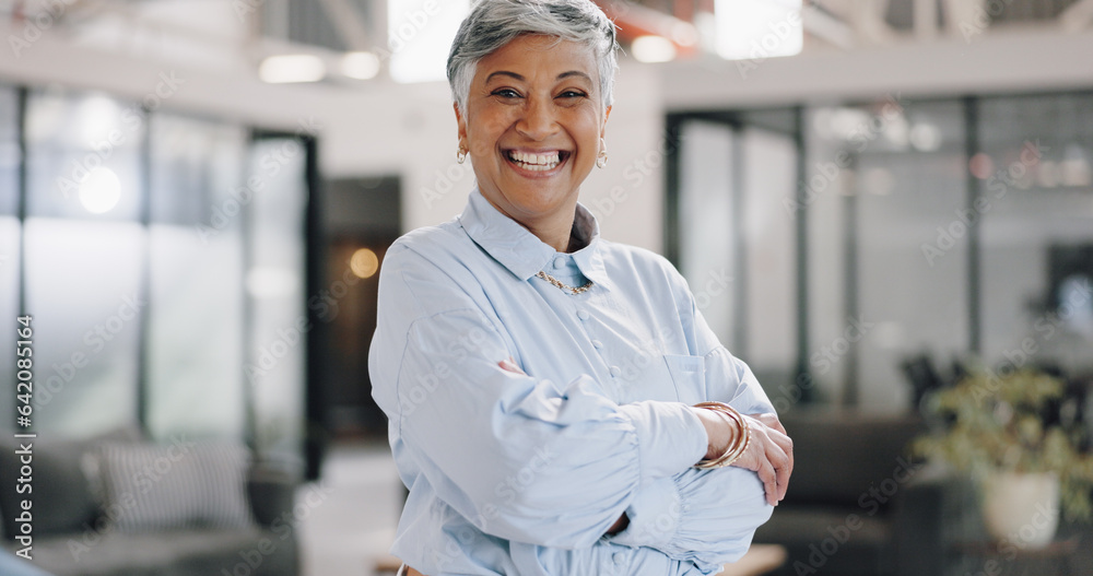 Portrait, corporate and senior woman with arms crossed, smile and professional in a workplace, caree