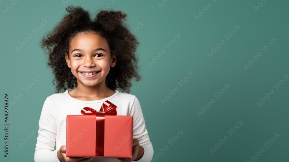 Girl with gift box on vivid background