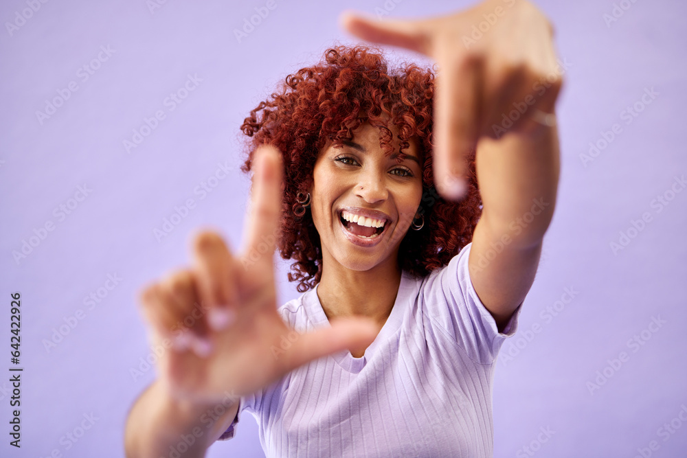 Portrait, hands frame and happy woman in studio isolated on a purple background mockup space. Face, 