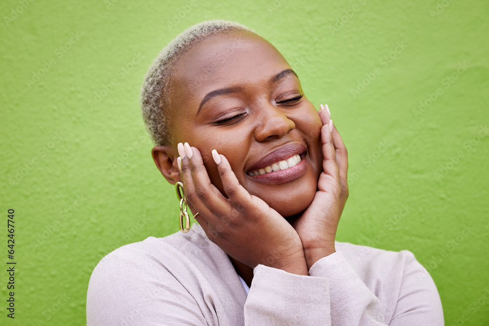 Laughing, black woman and self love or pride on a green wall for fashion, thinking or trendy. Smile,