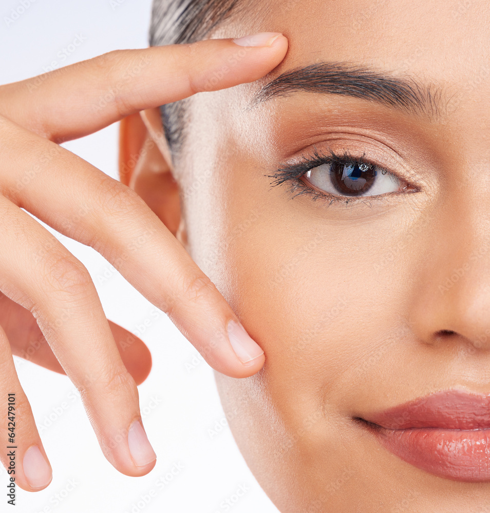 Half face, closeup and woman with skincare, beauty or dermatology on a studio background. Portrait, 