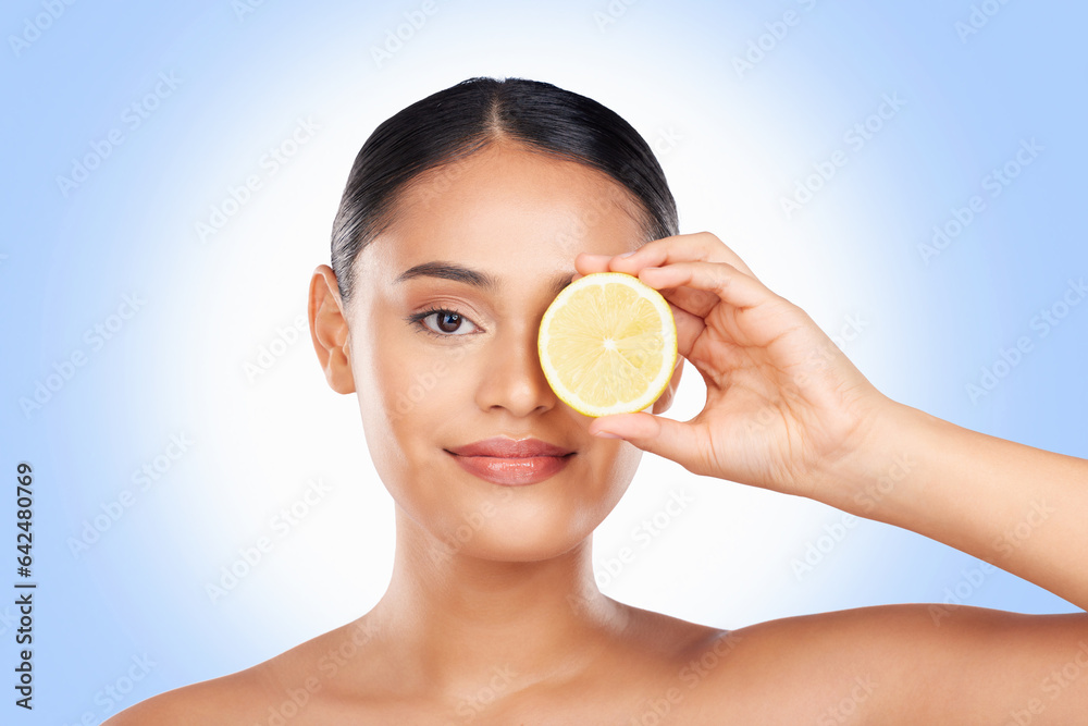 Skincare, portrait and studio woman with lemon for organic anti aging treatment, natural self care r