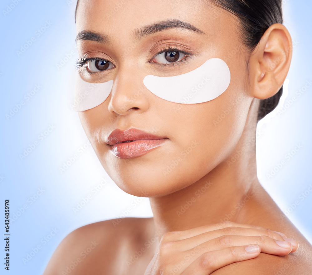 Skincare, portrait and woman with eye patch for anti aging luxury skin glow on blue background. Cosm