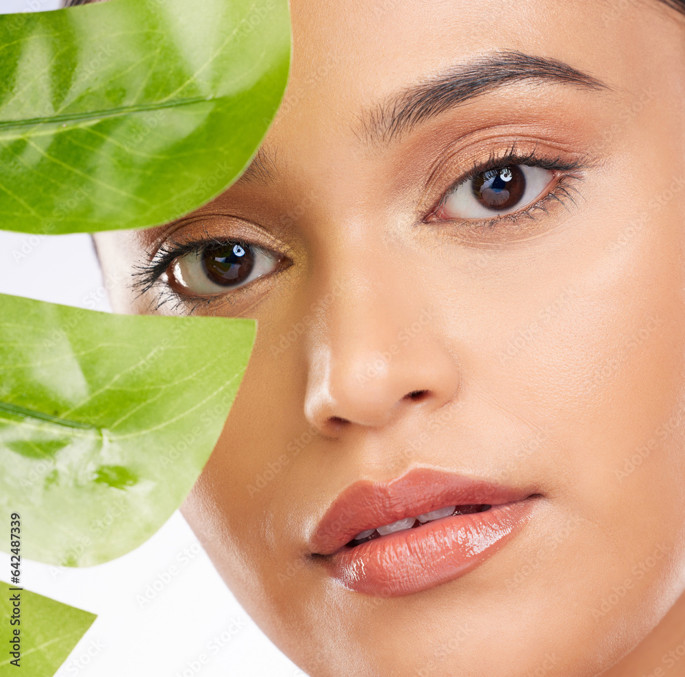 Woman, portrait and plants for natural skincare, cosmetics and facial beauty on a white background. 