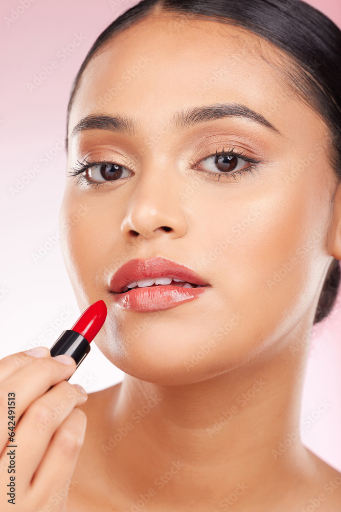 Portrait, beauty and lipstick with a woman closeup on a pink background in studio for luxury cosmeti