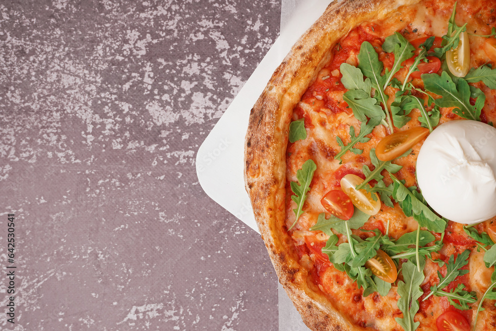 Tasty pizza with Burrata cheese on grey background