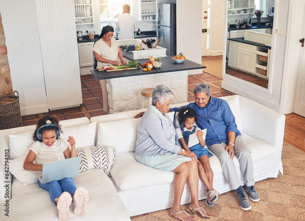 Big family, above and with technology in the living room with grandparents for cartoon or gaming. Ha