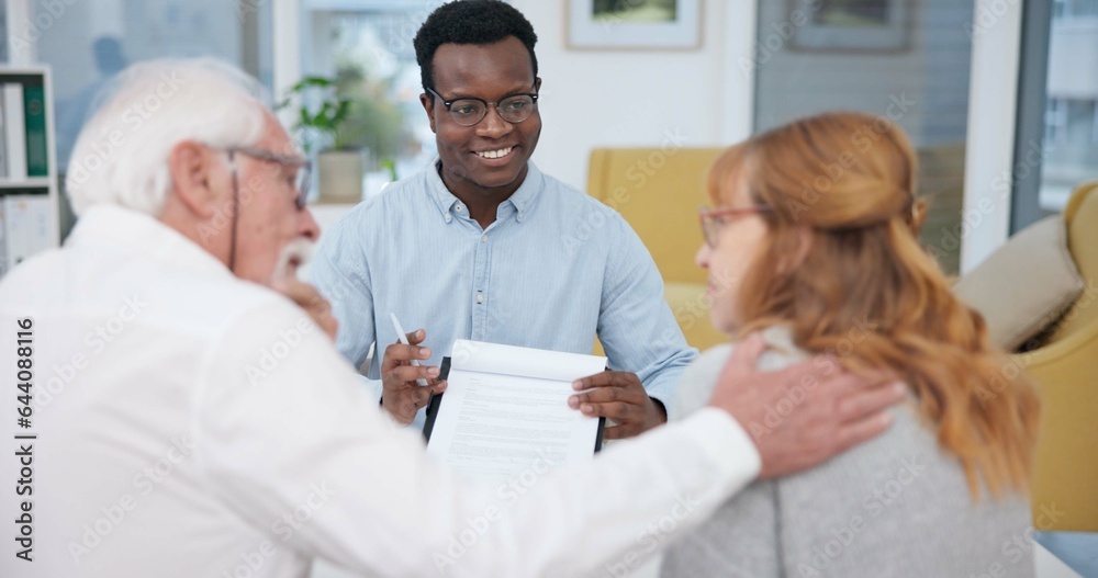 Senior couple, explanation and contract with financial advisor and retirement plan to sign. Document