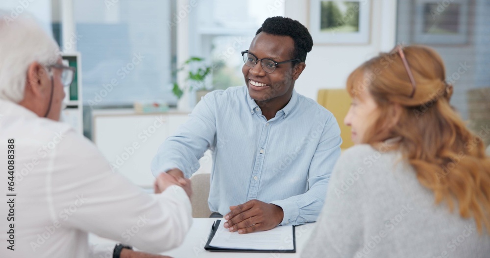 Senior couple, insurance agent and handshake with planning and investment at meeting. Finance, shaki