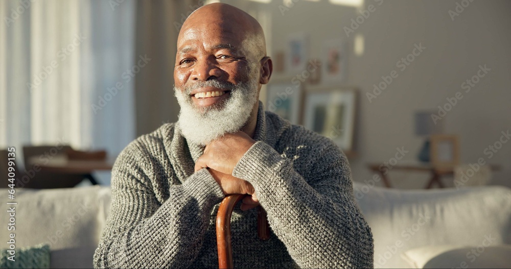 Happy, face and a black man with a cane on the sofa for support, medical help and retirement. Smile,