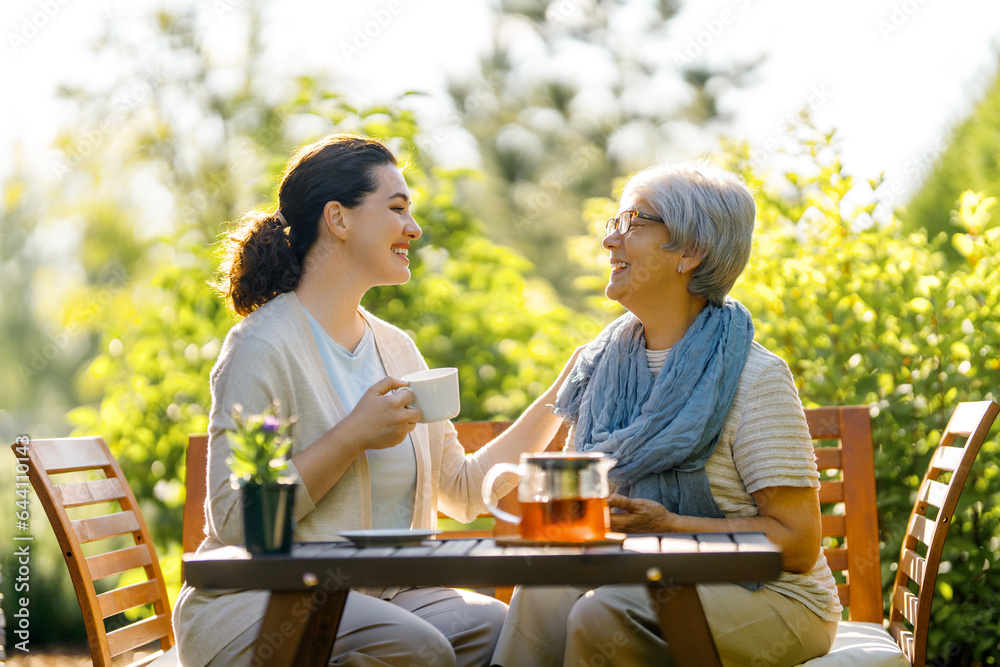 women drinking tea in the garden