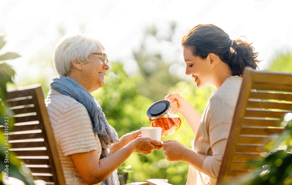 women drinking tea in the garden