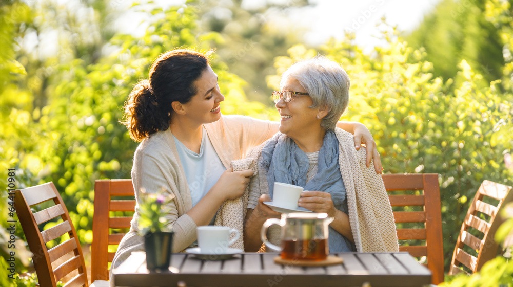 women drinking tea in the garden