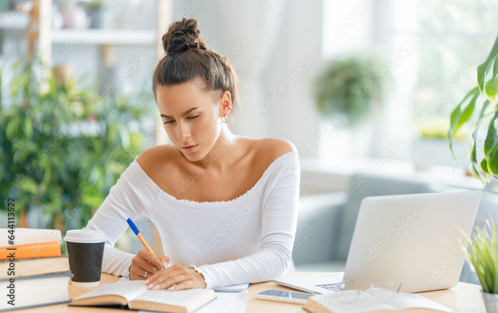 woman working on laptop at home