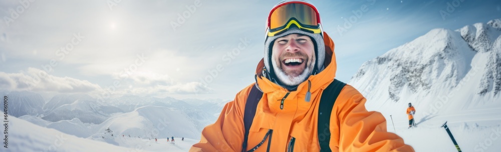 An man skiing on a snowy mountain