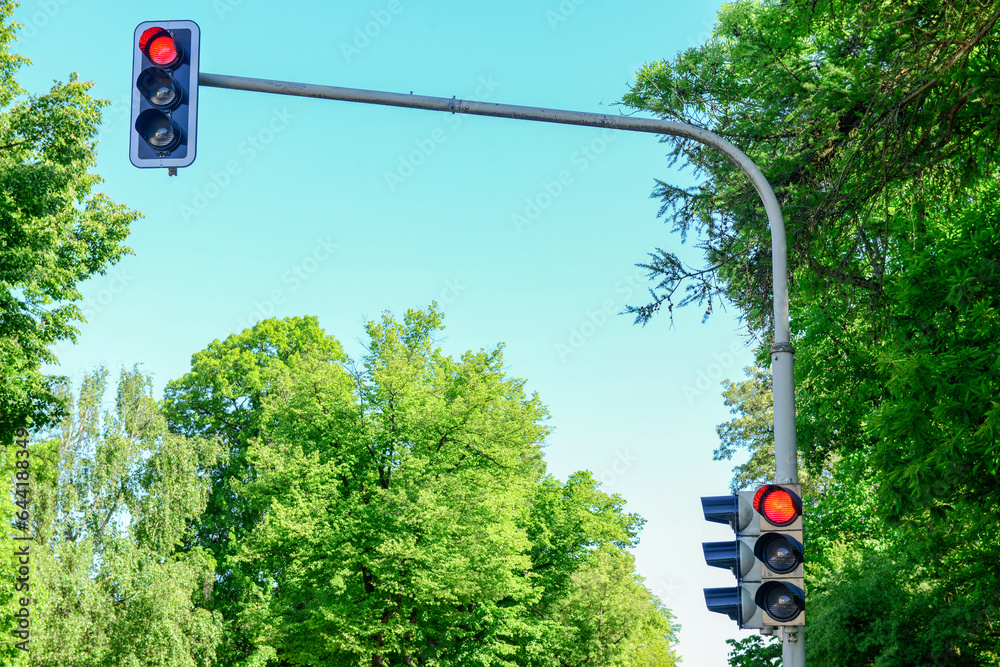 View of red traffic lights in city