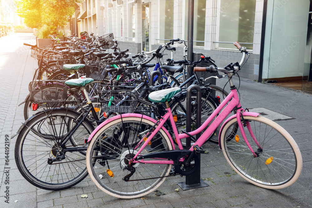 Modern bicycles parked on city street