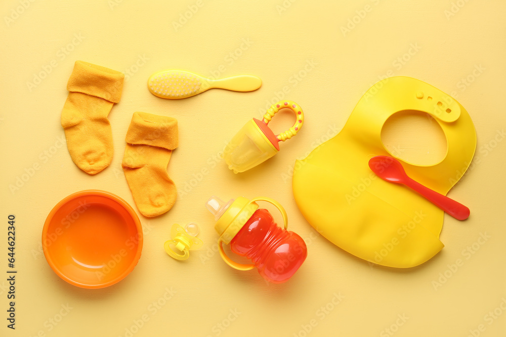 Composition with colorful baby accessories on color background