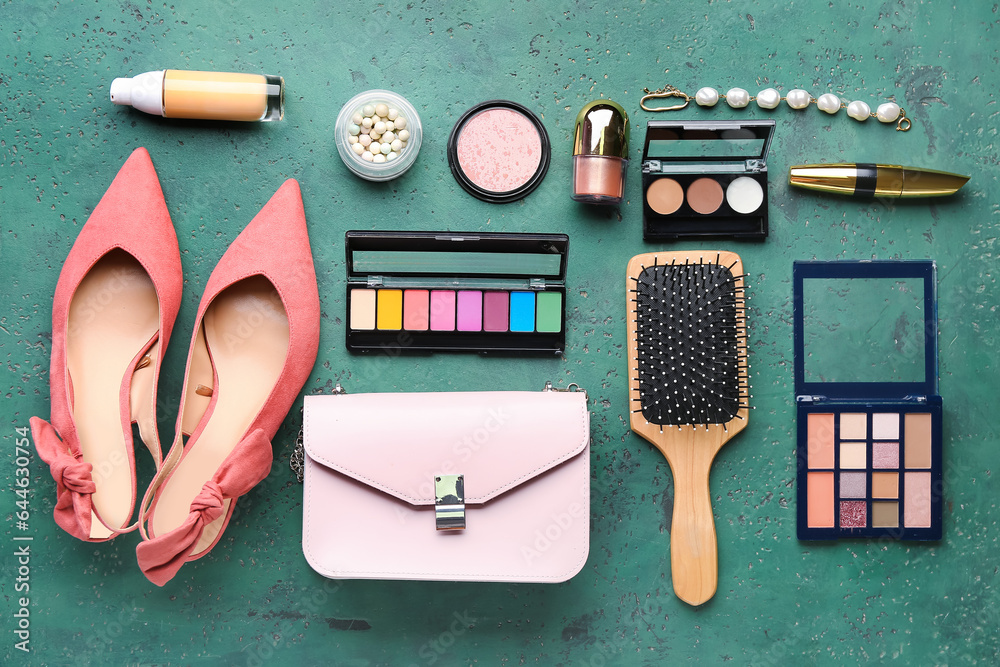 Composition with stylish female shoes, accessories and cosmetics on color background