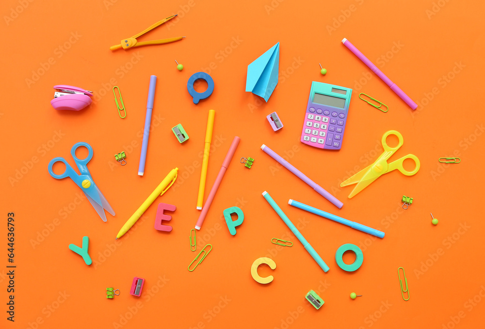 Composition with different stationery and letters on color background