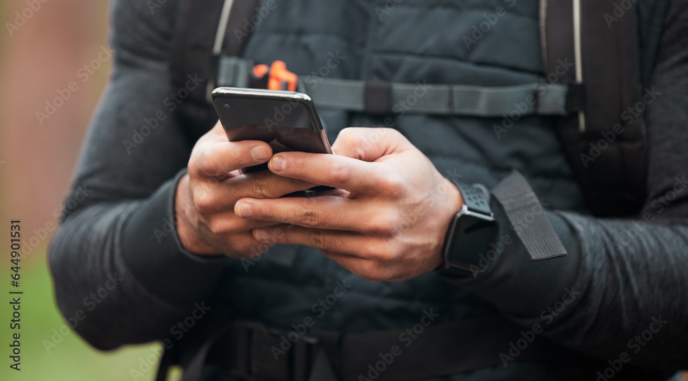 Closeup, man and runner with a cellphone, typing and connection with tracking progress, network or c