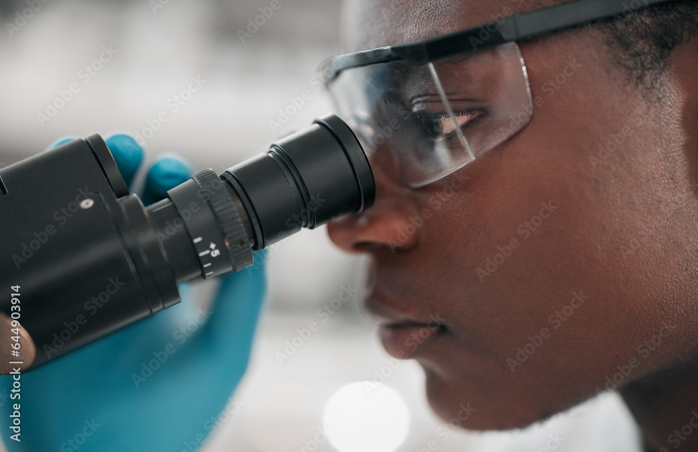 Microscope, black man and healthcare with research, medical and dna test with biotechnology. African