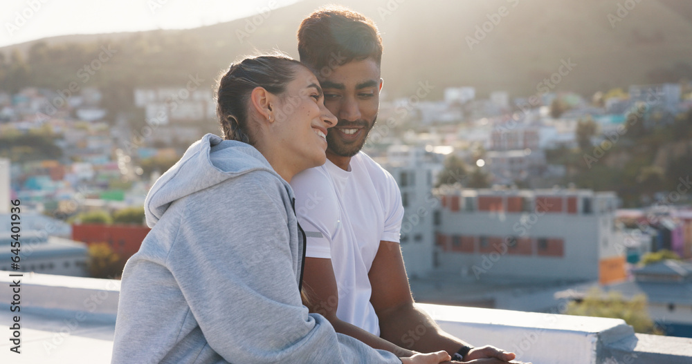 Happy couple, fitness and hug on rooftop break after workout, training or outdoor exercise together 