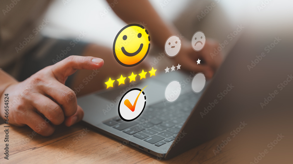 Customer service and satisfaction concept. Client choosing on the happy smile face icon to give sati