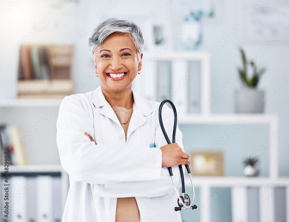 Doctor, senior woman and stethoscope, arms crossed for healthcare in hospital and professional cardi