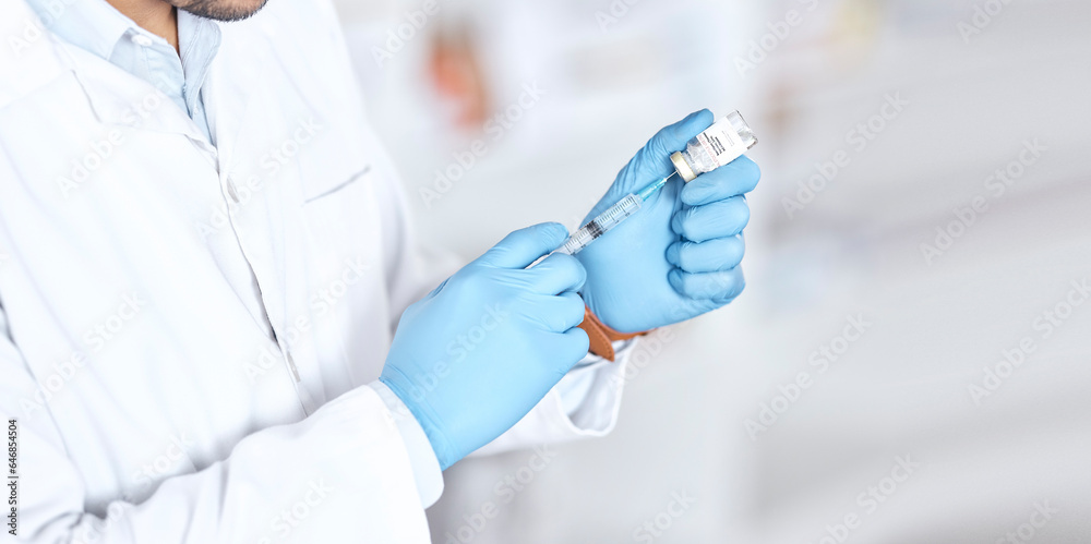 Hands, healthcare a vaccine with a doctor in the hospital closeup for treatment or cure using a syri