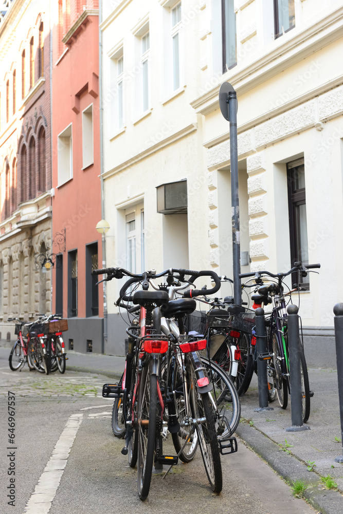 Modern bicycles parked on city street