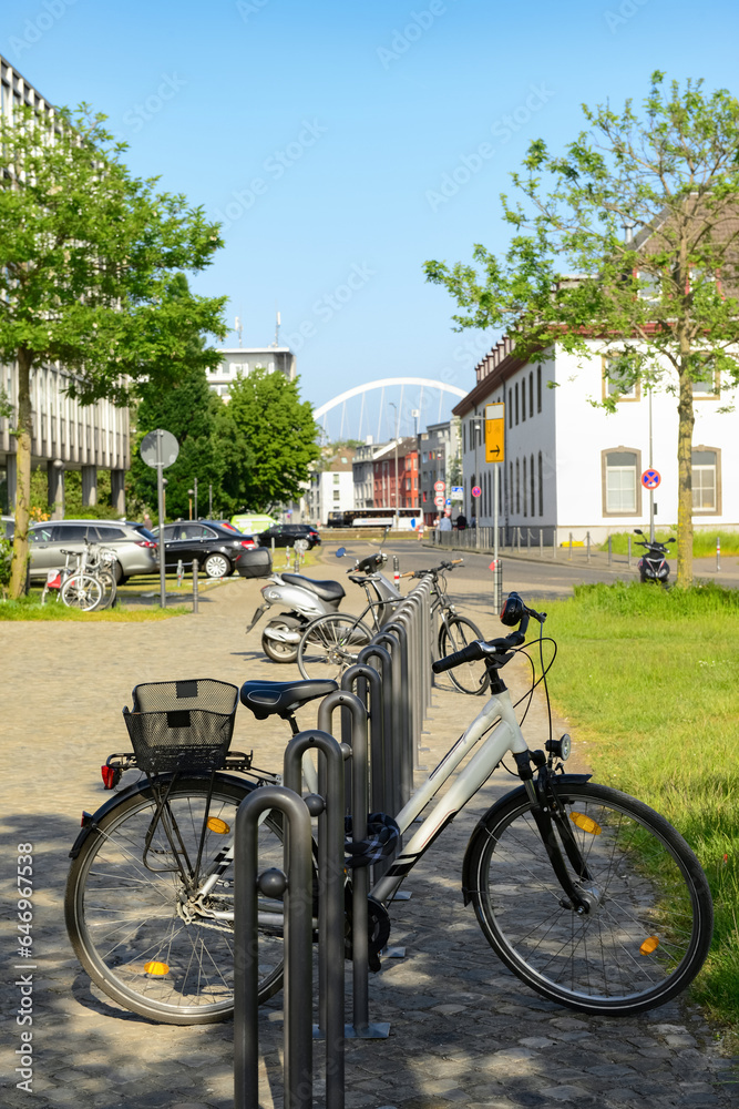 Modern bicycle parked on city street