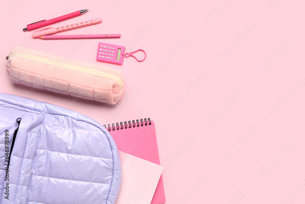 Stylish school backpack with different stationery supplies on pink background