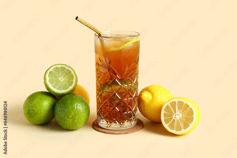 Glass of cold Long Island iced tea on light background