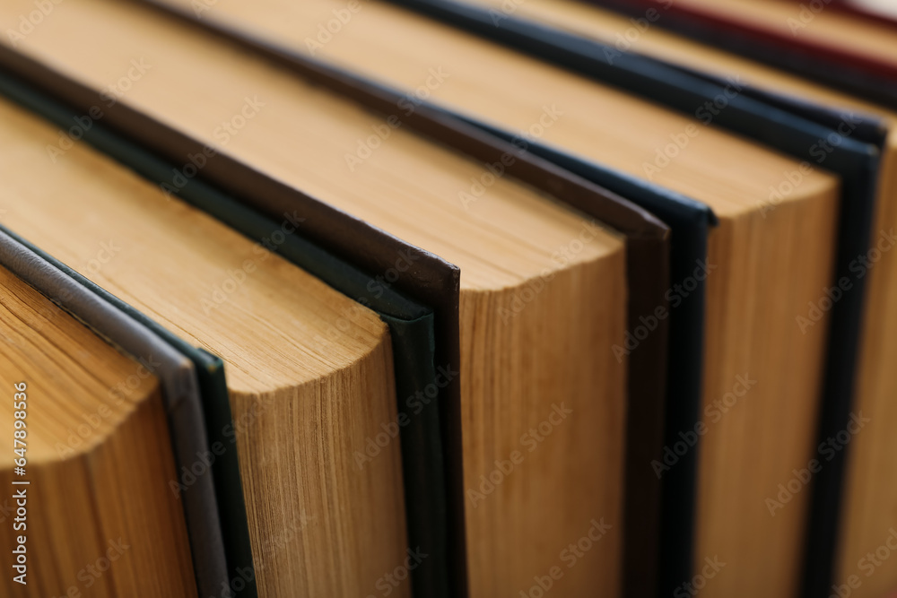 Closeup view of stacked old books as background