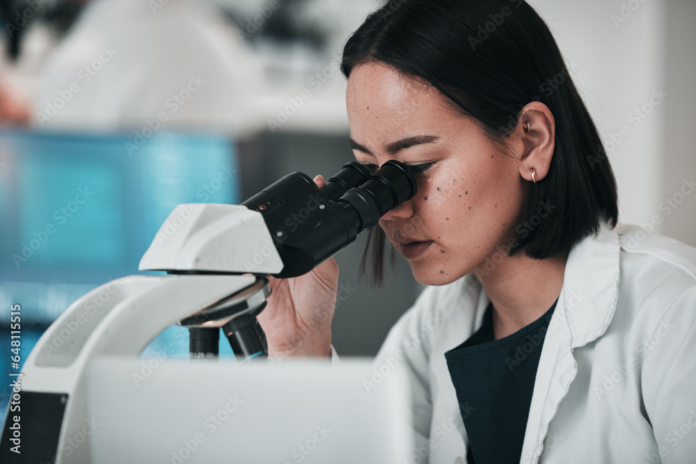 Science, microscope and Asian woman in laboratory for research, data analysis and study. Biotechnology, healthcare and scientist looking in equipment for medical innovation, sample and DNA testing