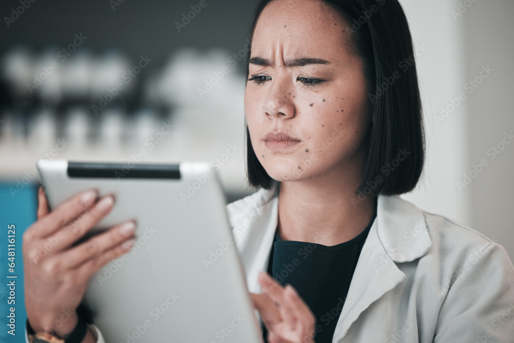 Tablet, pharmacy and confused Asian woman in laboratory for website, wellness app and telehealth. Healthcare, pharmaceutical and worker on digital tech for medical service, medicine and research