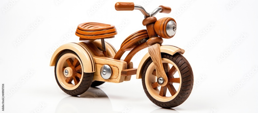 Wooden tricycle on plain backdrop