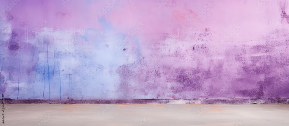 Textured pastel cement wall with a surface shade of violet