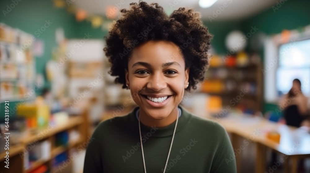 Portrait of happy African American kindergarten teacher in a kindergarten.