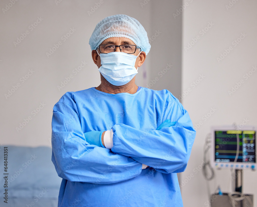 Surgeon, portrait and man with arms crossed in hospital with confidence in emergency healthcare, medicine or cardiology. Doctor, face mask and pride in surgery, work and operating room or theater