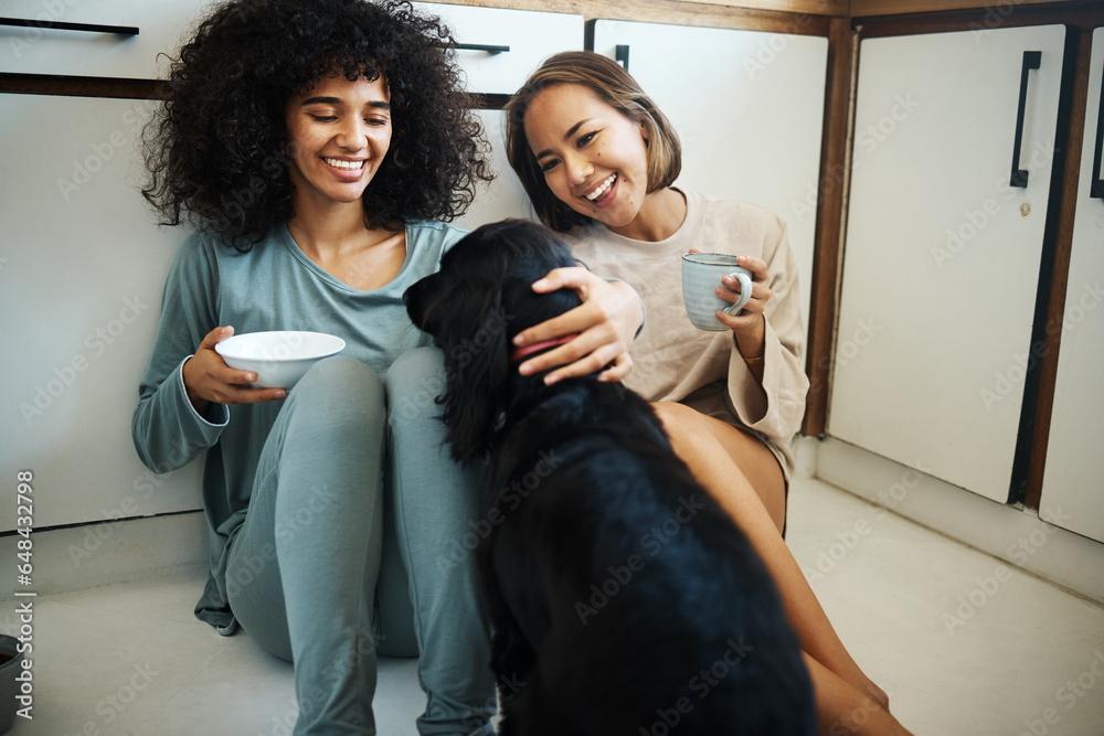 Friends, dog and happy morning in kitchen, home or women with coffee, drink and eating breakfast on the floor of apartment. Couple, animal or pet in house with love, care and support from girls