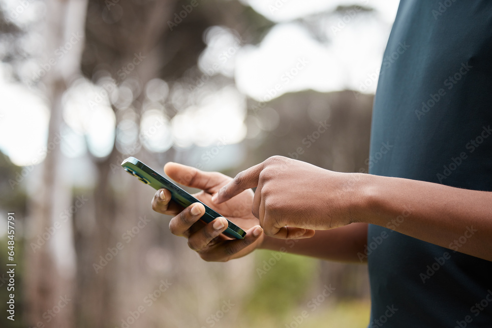 Man, hands and phone in fitness, social media or outdoor networking for communication in nature. Closeup of male person typing in online texting, sports research or chatting on mobile smartphone app