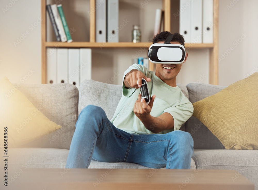 Virtual reality glasses, smile and man with game, controller and futuristic with connection, relax and software. Person, gamer or guy on a sofa, VR eyewear and metaverse with online playing and home