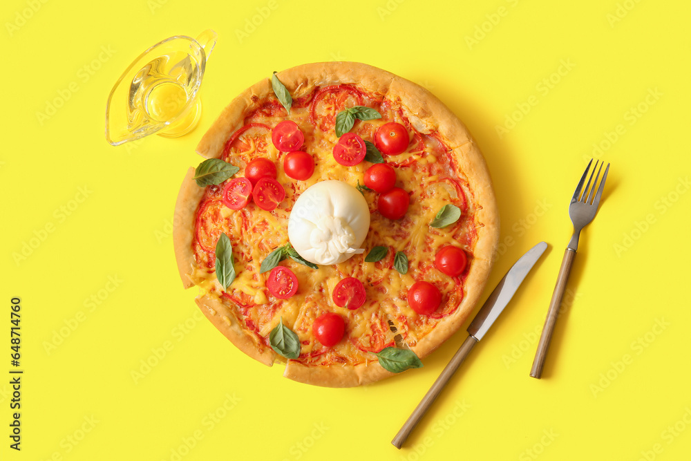 Tasty pizza with Burrata cheese on yellow background