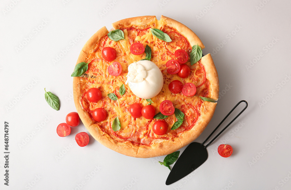 Tasty pizza with Burrata cheese on grey background