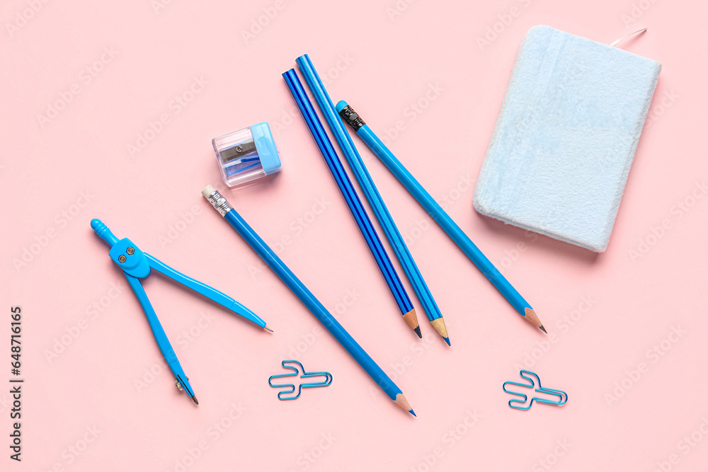 Set of colorful stationery on pink background