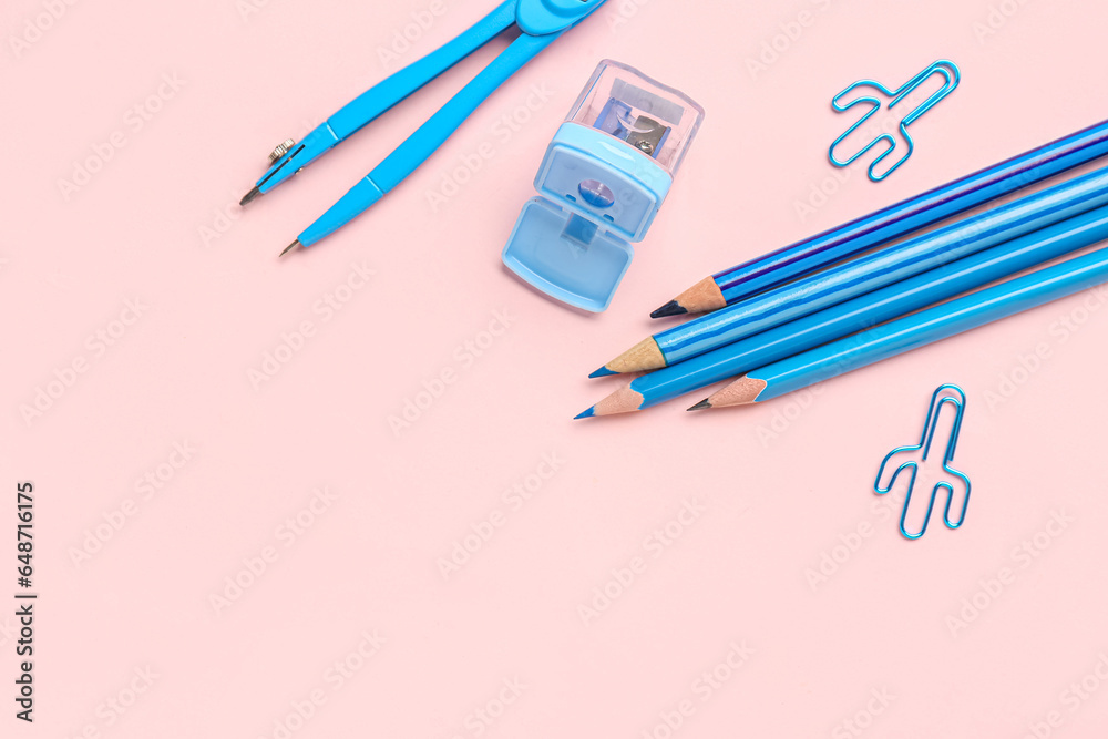 Set of colorful stationery on pink background