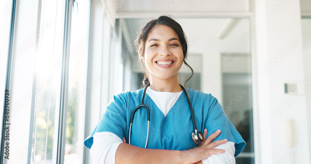 Doctor in portrait, woman with arms crossed and healthcare, smile with confidence at hospital with pride and help. Medical professional, trust and consultation at clinic with scrubs and medicine