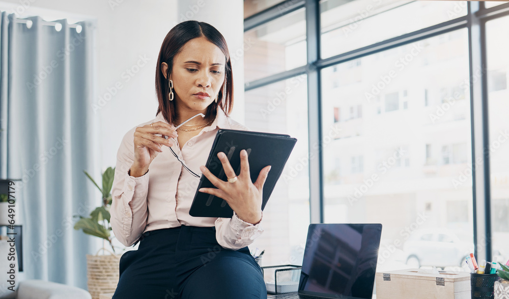 Businesswoman in office, reading and thinking with tablet for email, HR schedule or report online for feedback. Research, networking and communication on digital app, woman at human resources agency.